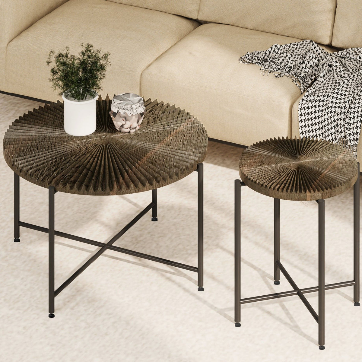 Pair of round dark brown end tables with radial distressed wood tops and black metal legs