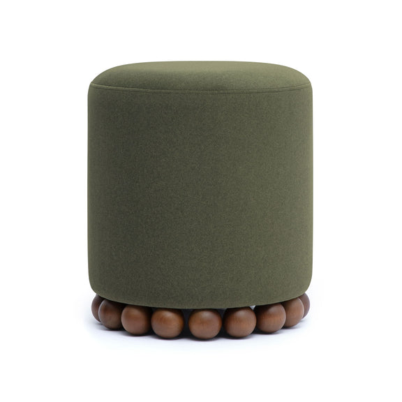 Round upholstered ottoman in dark green with beaded wooden base