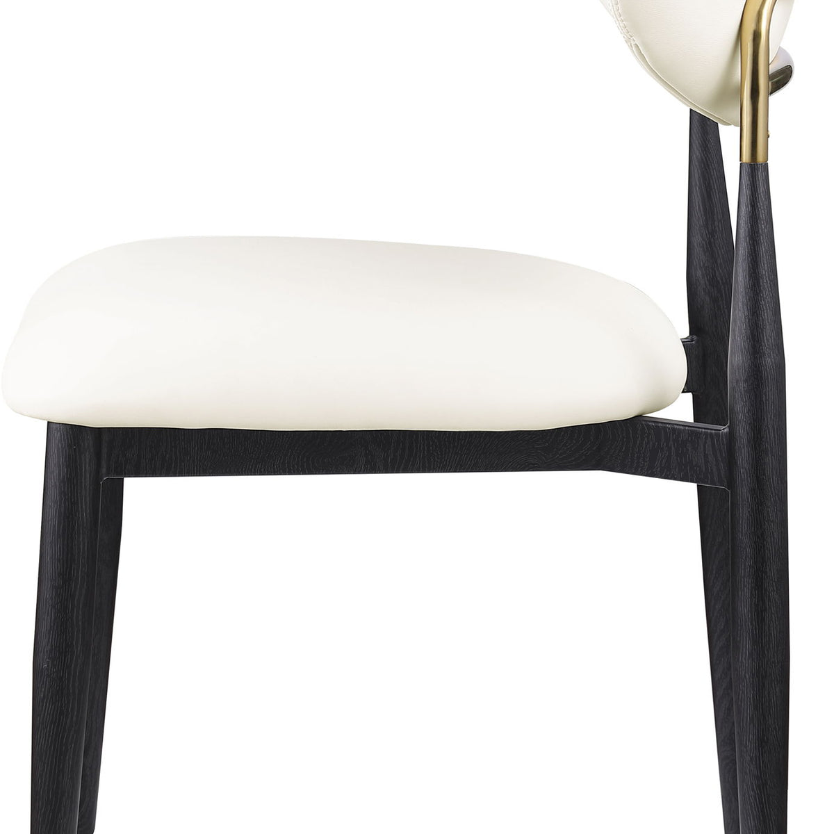 Dining side chair with white upholstered seat and rounded back, black legs