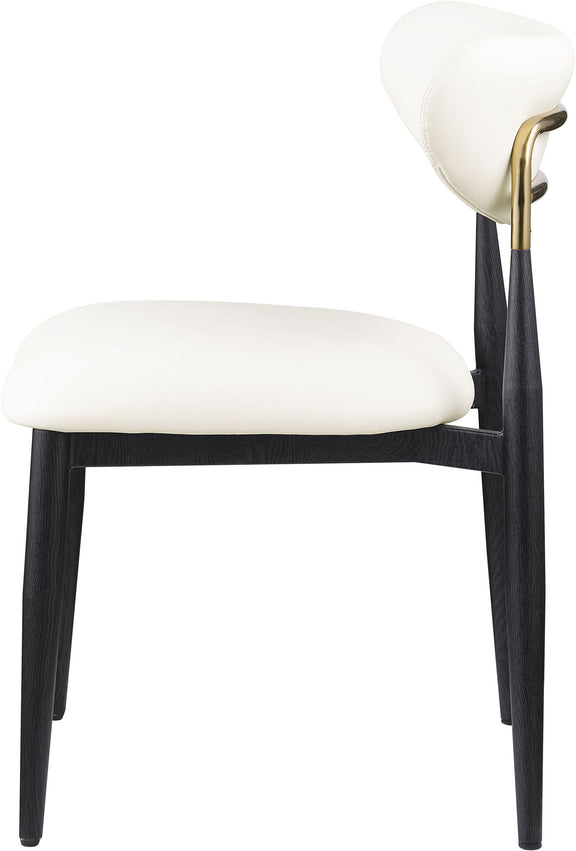 Dining side chair with white upholstered seat and rounded back, black legs