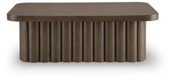 Dark brown rectangular table featuring a rounded, dark tabletop and slatted skirt
