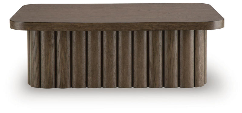 Dark brown rectangular table featuring a rounded, dark tabletop and slatted skirt