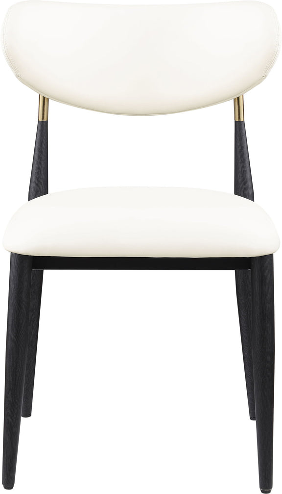Upholstered dining side chair with white seat and rounded back, black legs