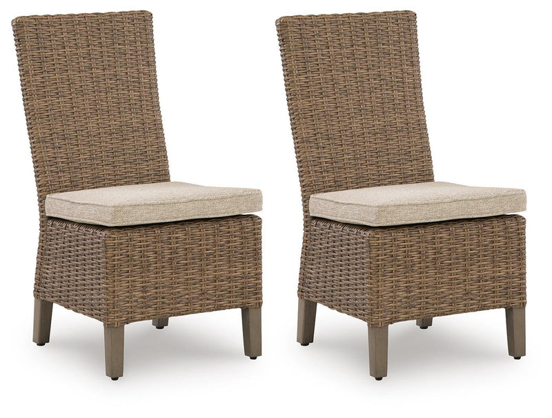 Pair of beige woven side chairs with light beige seat cushions