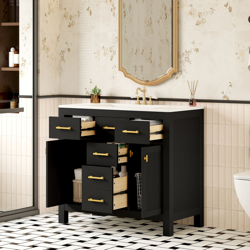 Black bathroom vanity with sink, open drawers and doors revealing wood-tone drawer interiors