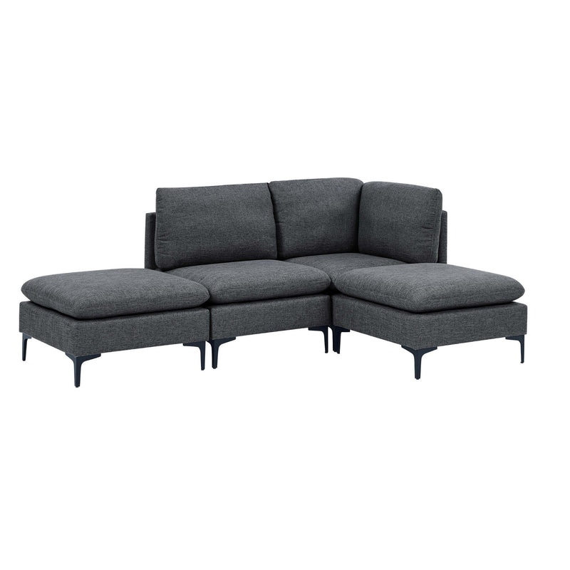 Dark gray upholstered modular sectional with tall legs, corner chaise and ottoman-style seats