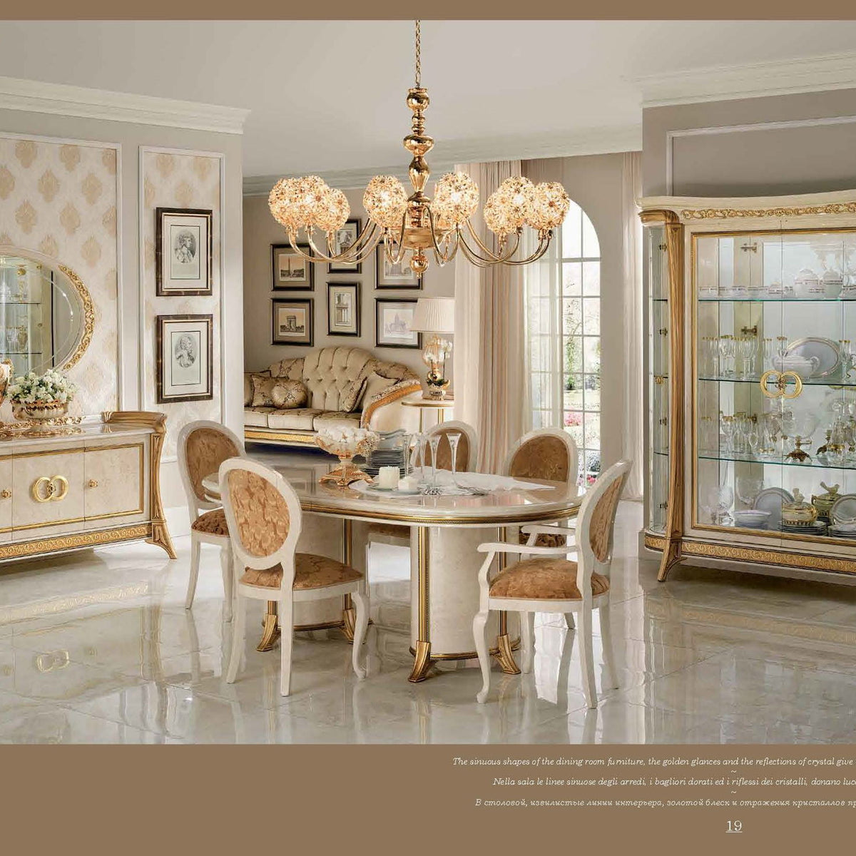 Beige and gold 4-door glass display cabinet with ornate crown and side glass panels