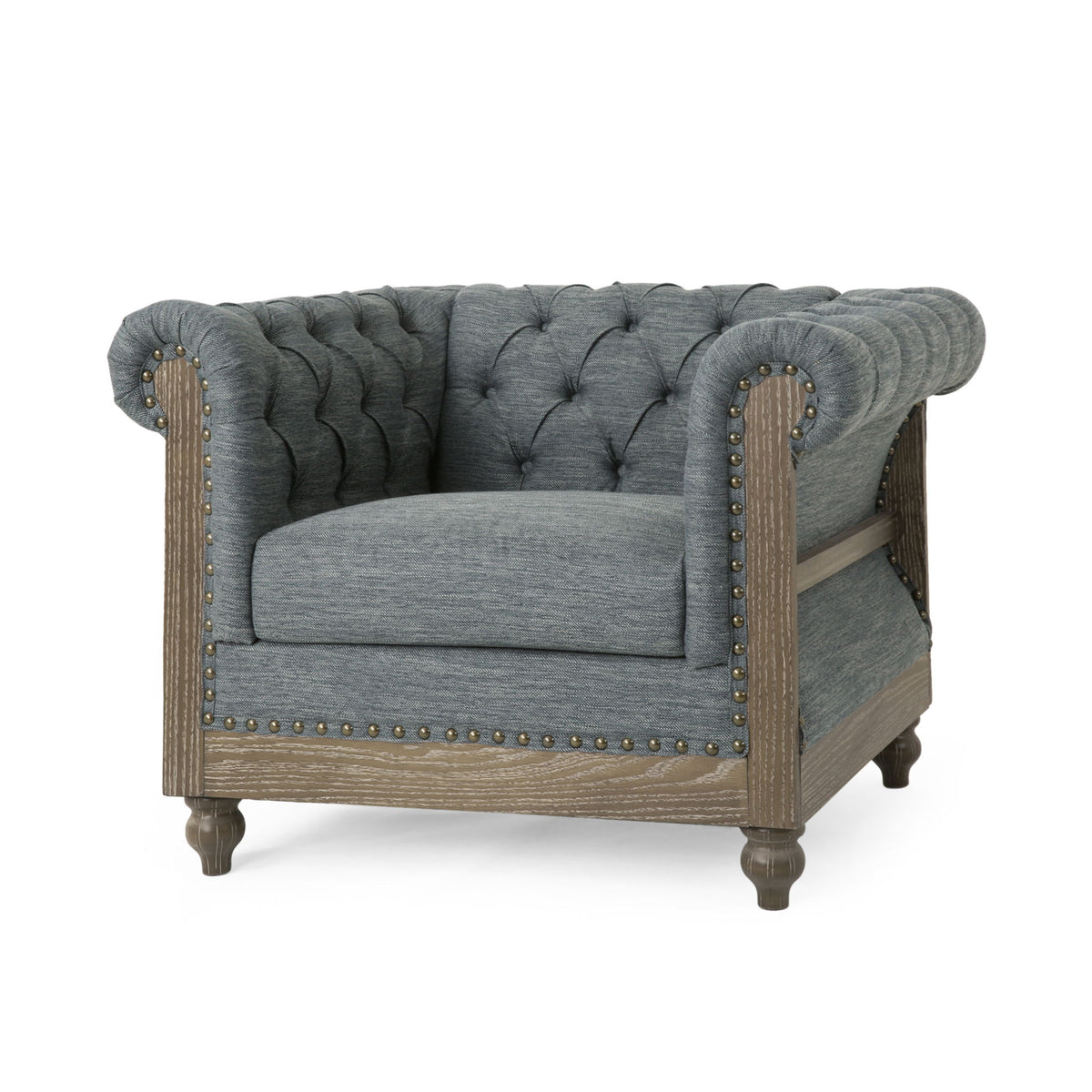 Charcoal fabric club chair with tufted back, scrolled tuxedo arms, and brass nailhead trim