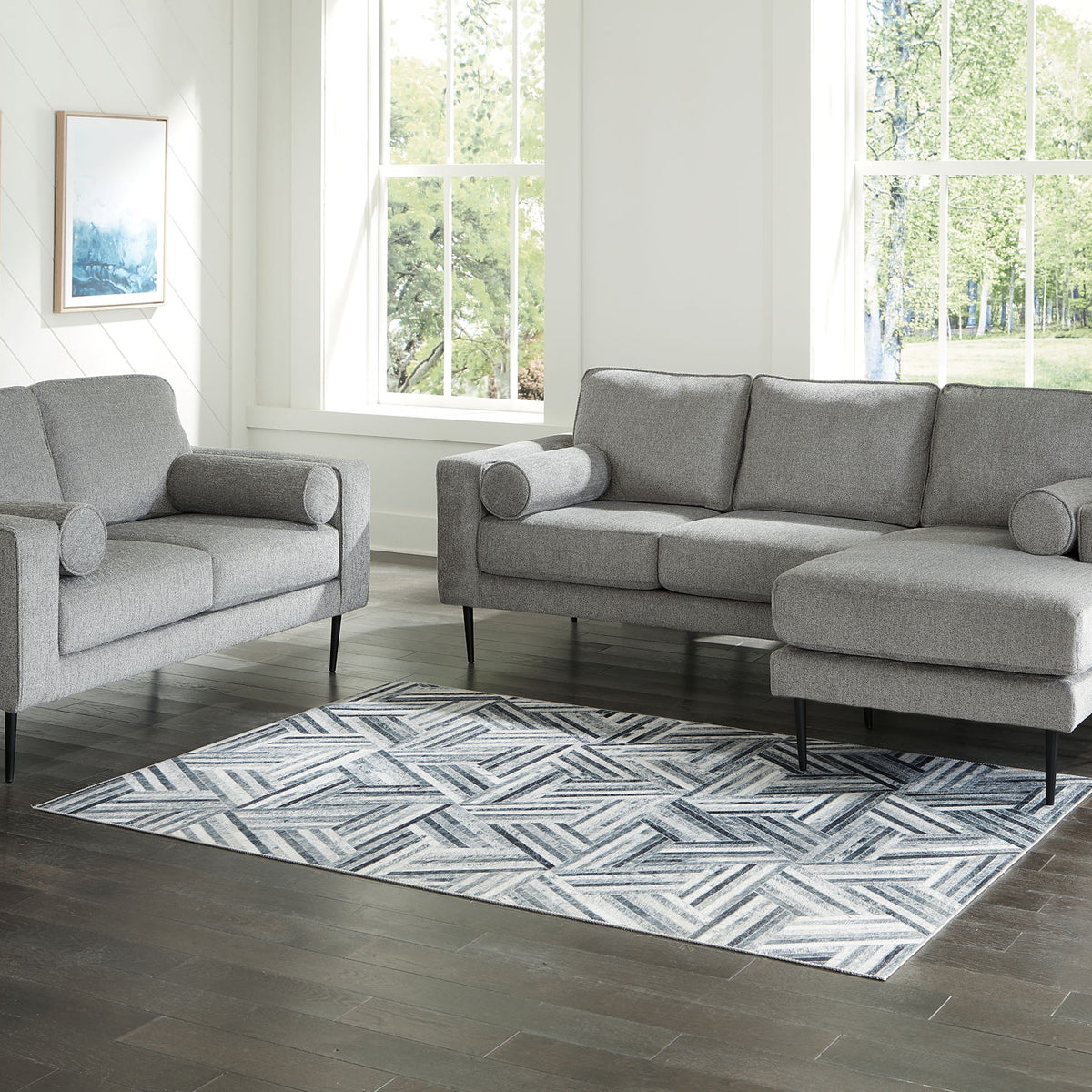 Charcoal 2-piece sofa chaise with matching loveseat, chaise cushion, round bolster pillows