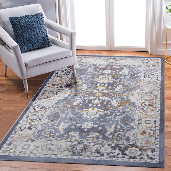 Blue traditional area rug with distressed medallion pattern and border, gray accents