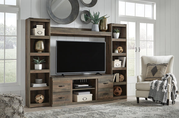 Dark brown entertainment center with TV stand, shelves, and unlit fireplace cabinet