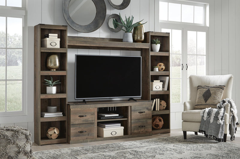 Dark brown entertainment center with TV stand, shelves, and unlit fireplace cabinet