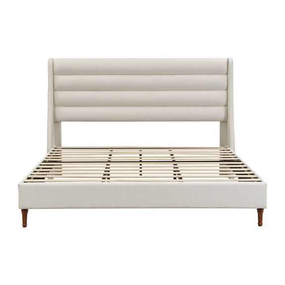 Beige upholstered platform bed with wave headboard and slatted mattress base