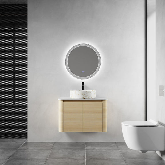 Mounted bathroom vanity in light wood with white marble-pattern vessel sink, front view