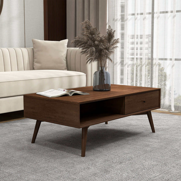 Walnut brown coffee table shown from the side, with one drawer and an open shelf
