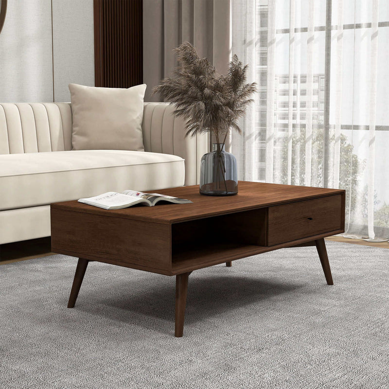 Walnut brown coffee table shown from the side, with one drawer and an open shelf