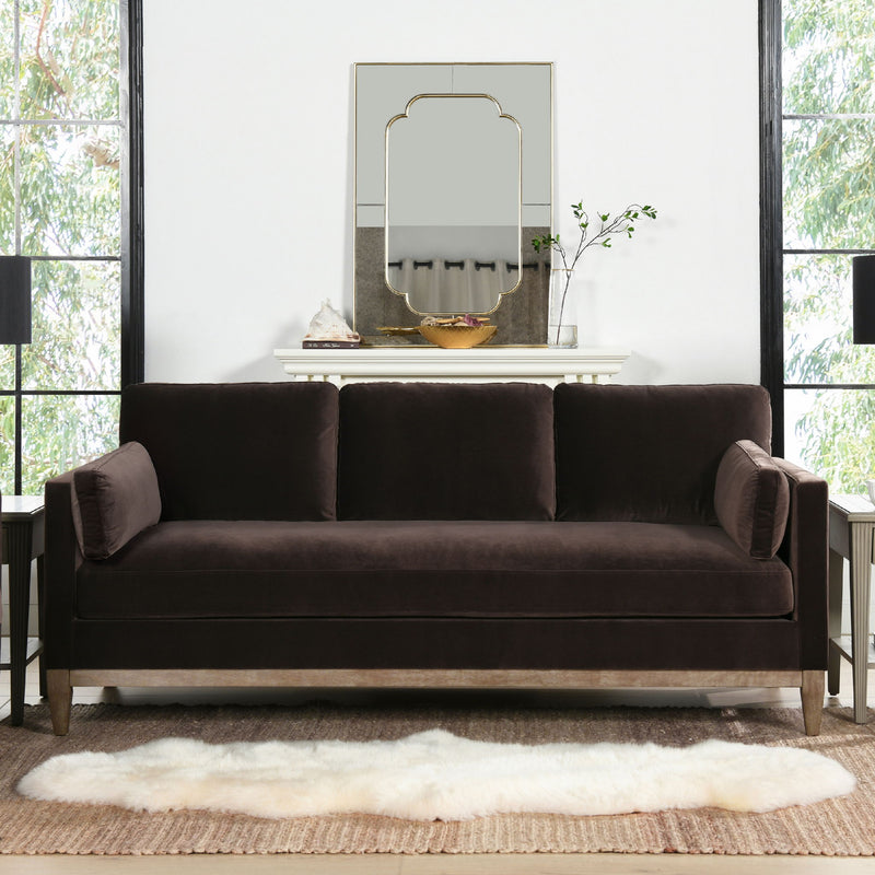 Modern farmhouse sofa in dark brown fabric with rolled arms and three back cushions