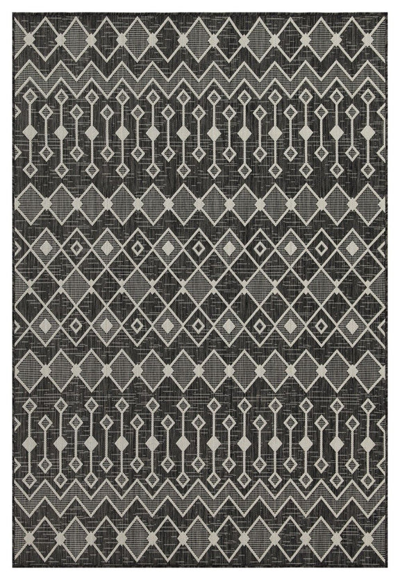 Indoor/outdoor polypropylene area rug, dark gray with light gray and white geometric bands.