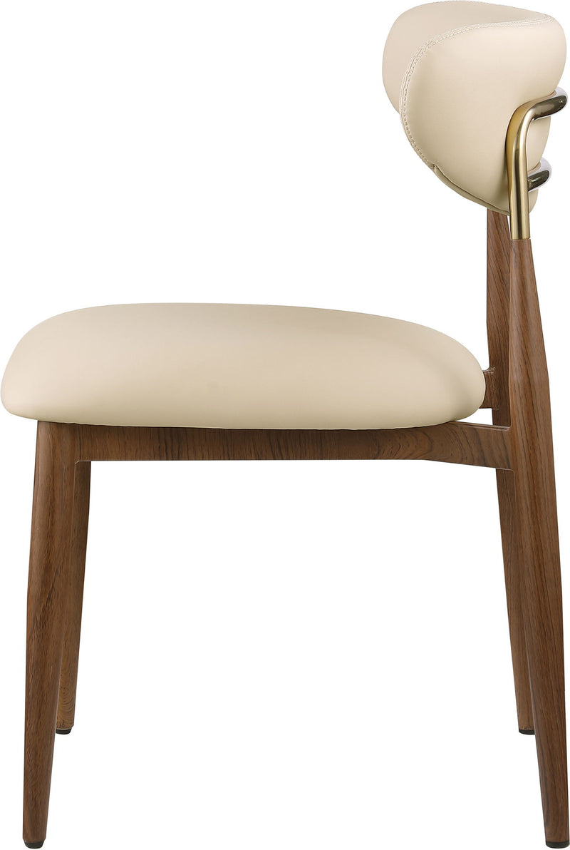 Cream upholstered dining side chair with rounded seat, curved back, and wood legs