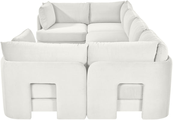 White velvet U-shaped sectional sofa with rounded back and padded armrests