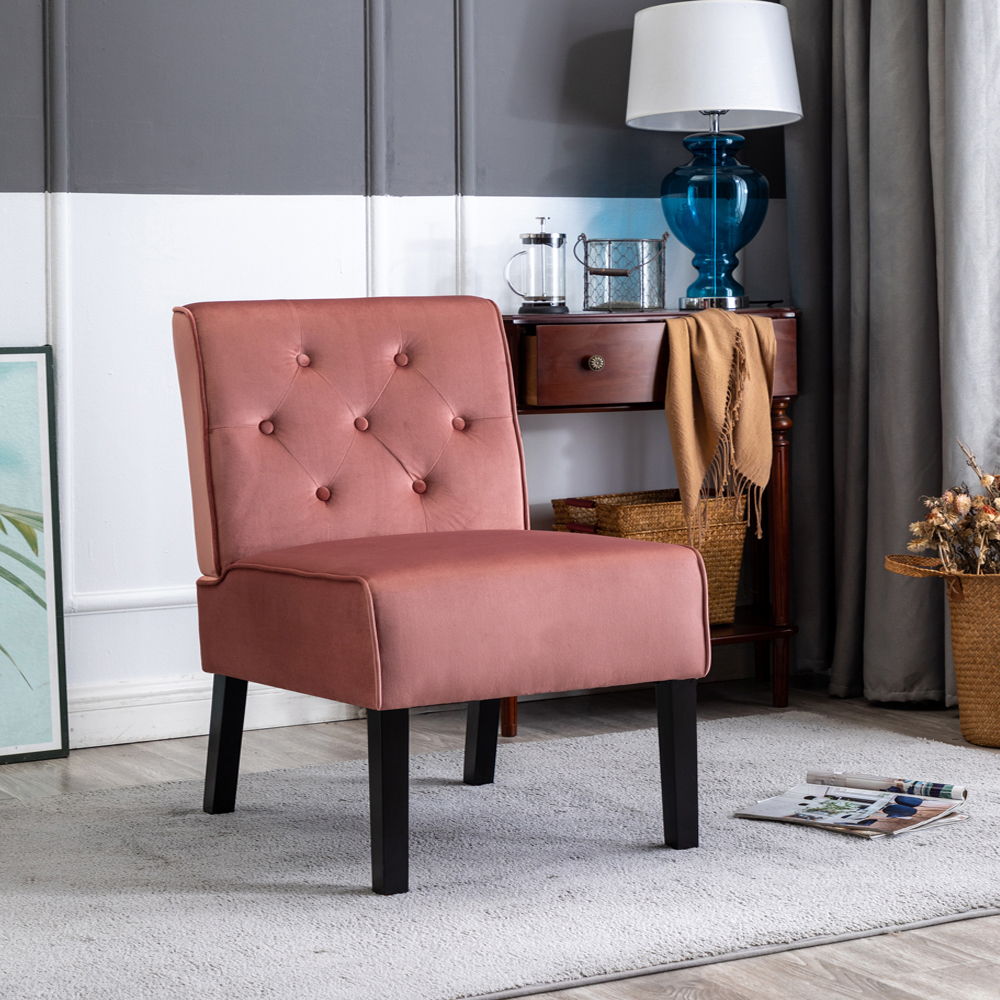 Pink armless accent chair with button-tufted back, padded seat, and black legs