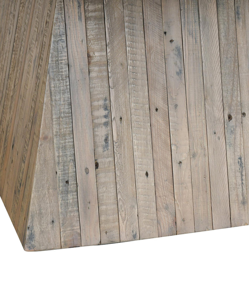 Weathered wood plank pedestal and apron detail on dining table base