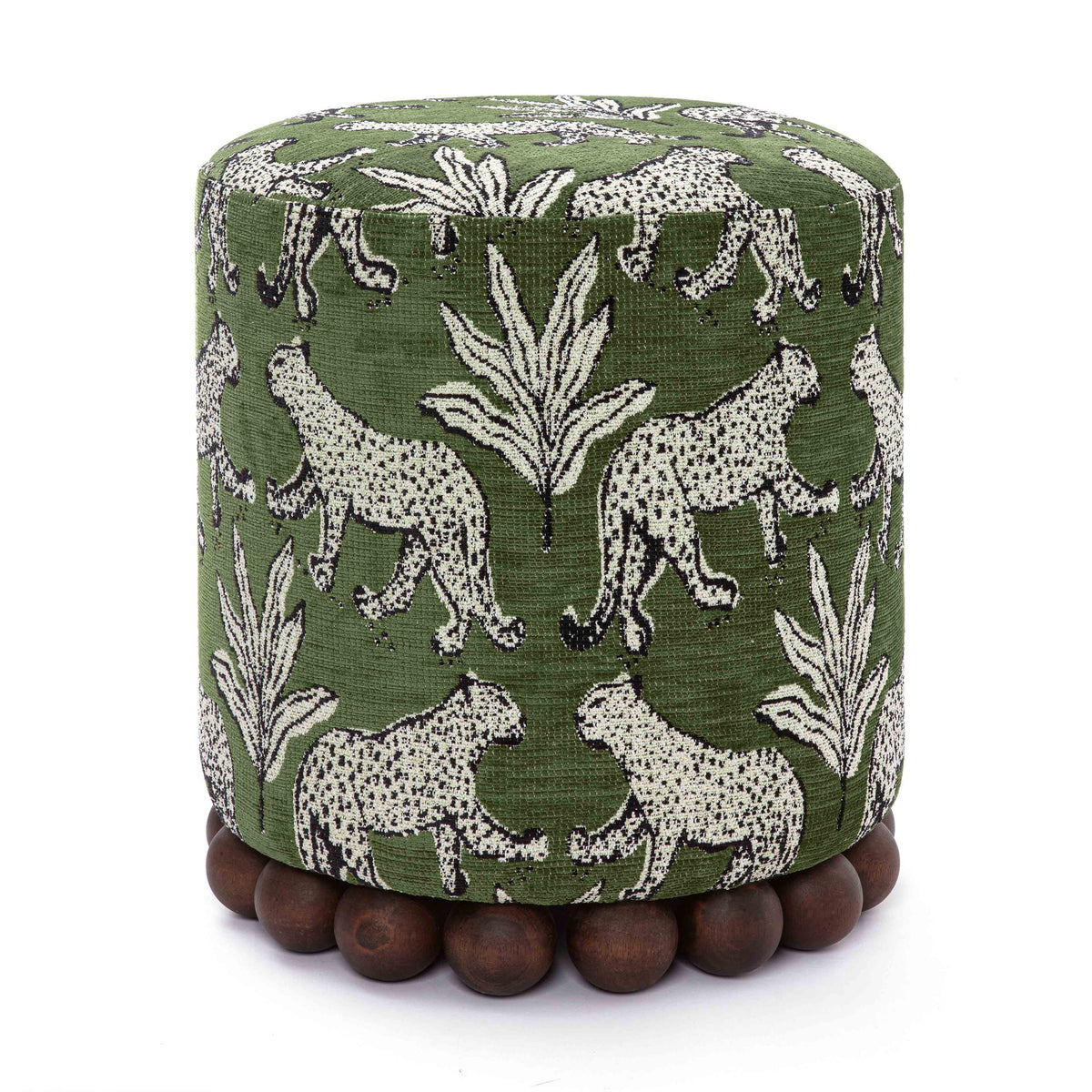 Dark green fabric ottoman with white animal pattern and dark wood ball base.