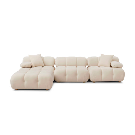 Light beige performance modular sectional sofa set with padded back cushions and chaise
