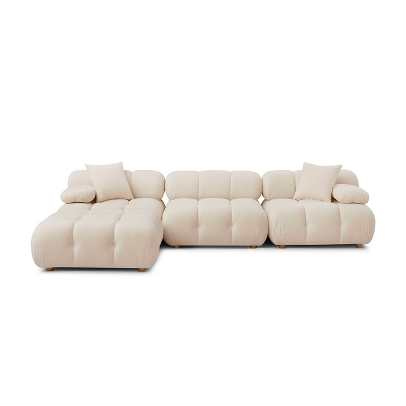 Light beige performance modular sectional sofa set with padded back cushions and chaise