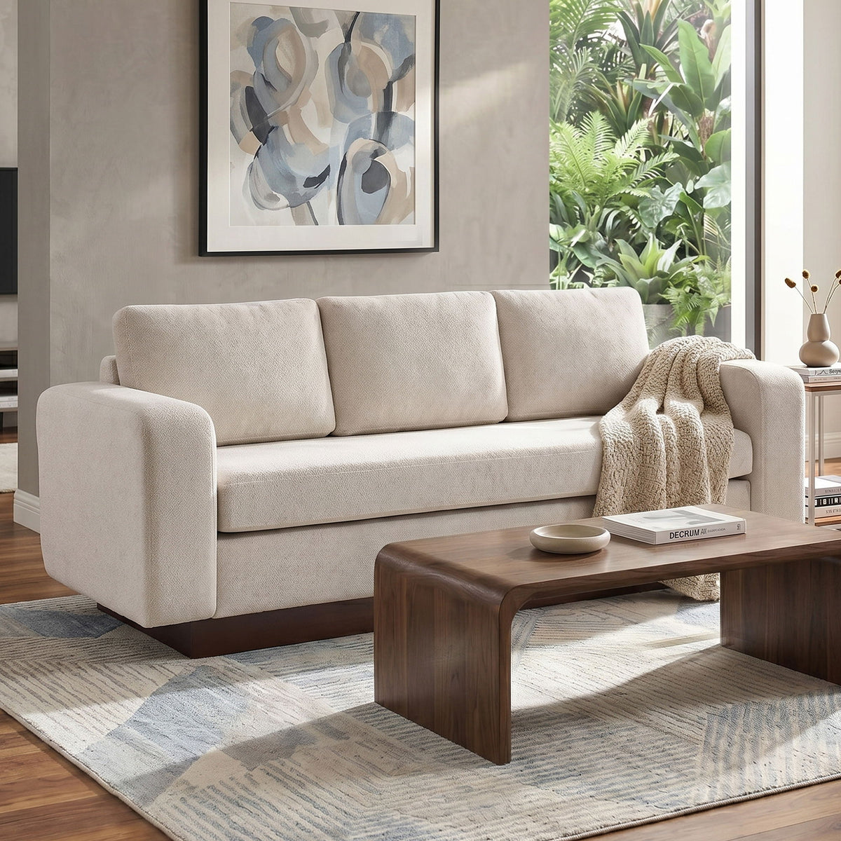 Light beige 3-seater sofa with plush square arms and back cushions