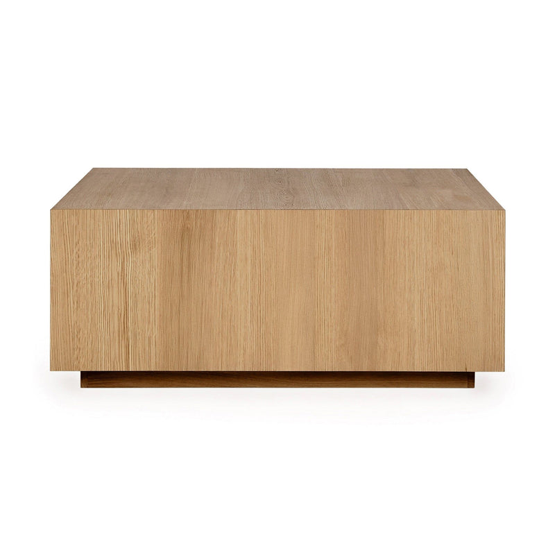 Square coffee table in natural oak wood with smooth tabletop and low caster-style base