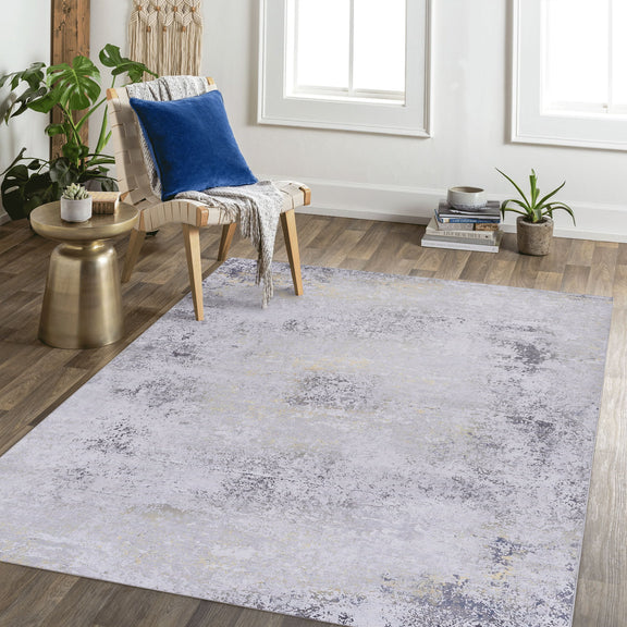 Washable area rug with light gray distressed abstract pattern, rectangular