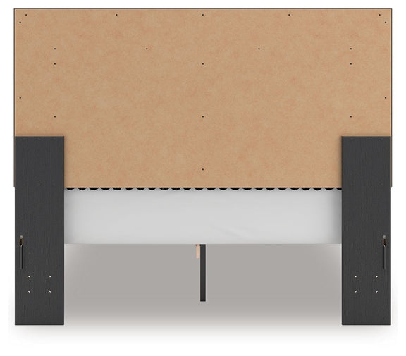Upholstered panel platform bed base with dark side rails and tan upholstered panel