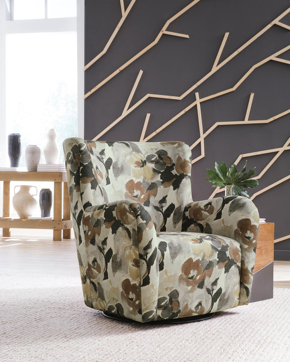 Floral swivel accent chair with green, brown, and cream upholstered arms and seat