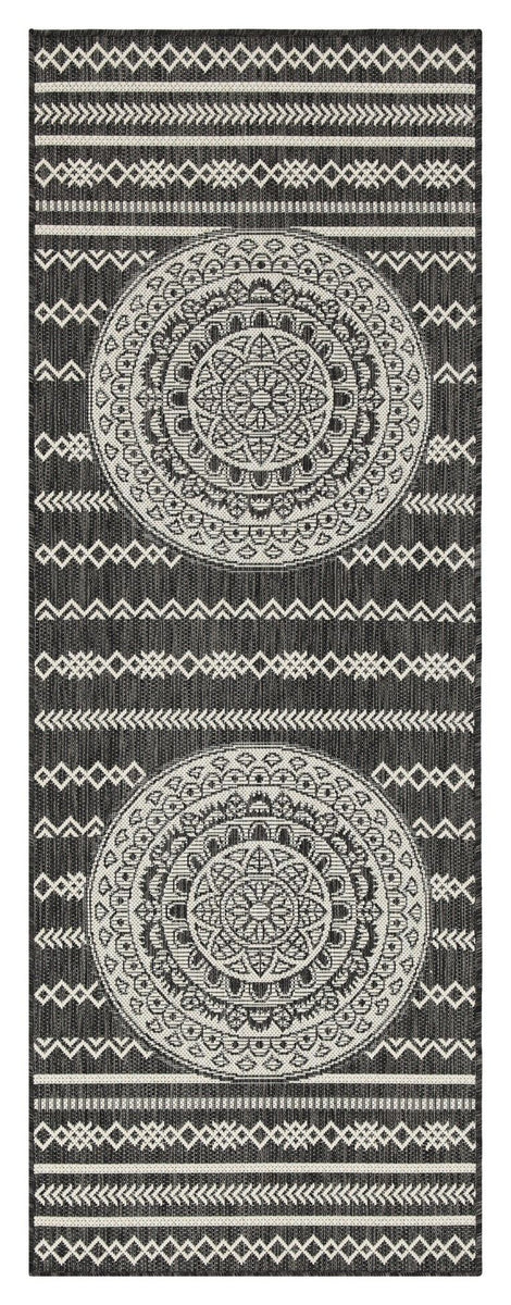 Indoor/outdoor area rug with black background, blue circular mandala medallions, and stripes
