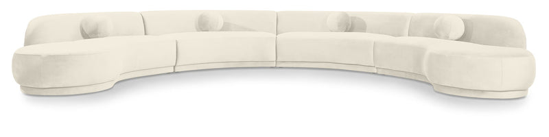 White velvet sectional sofa with curved back and cushioned armrests