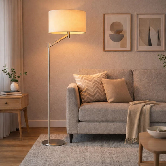 Floor lamp with brushed nickel pole, rotary switch base, and white linen drum shade