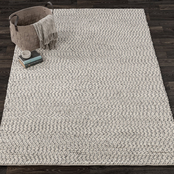 Dawson rug in light gray and cream with chunky chevron-style woven texture