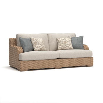 Wrights Beach beige sofa with woven frame, seat cushion, and four patterned and solid throw pillows