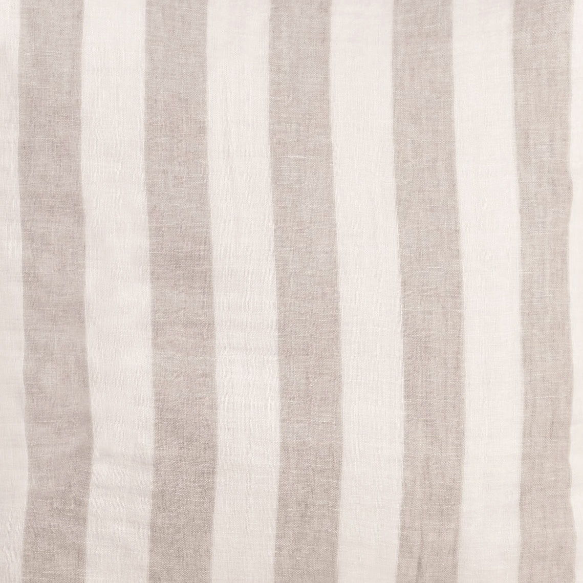 Close-up of pillow fabric with vertical ivory and natural stripe weave