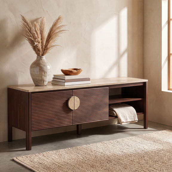 Varenna acacia wood media console with slatted front door and open side shelves, warm wood