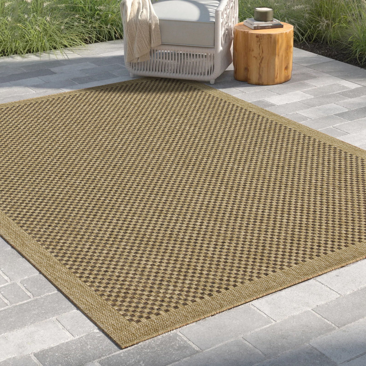 Light brown checkered polypropylene indoor/outdoor rug with flat woven surface