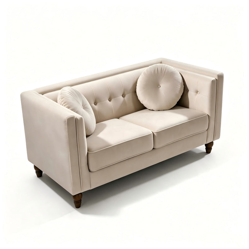 Beige tufted two-seater loveseat with round bolster pillow and rolled arms