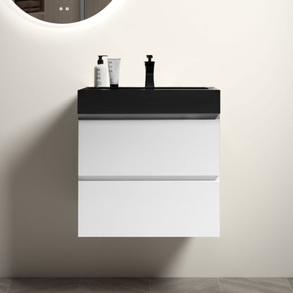 Wall-mounted bathroom vanity with black countertop, white drawers, and single rectangular sink