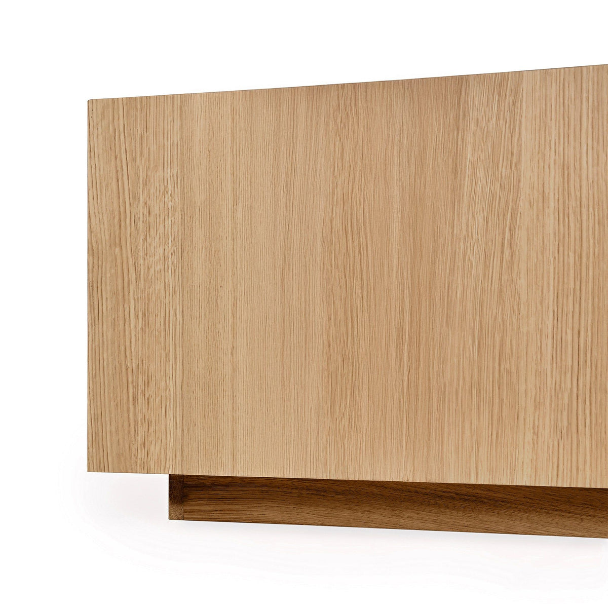 Square coffee table side view in natural oak wood with low base trim