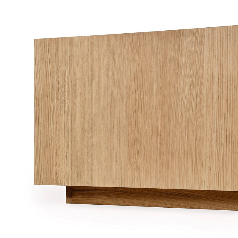 Square coffee table side view in natural oak wood with low base trim
