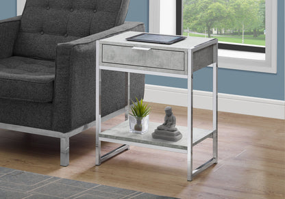 Gray side table with storage drawer and open lower shelf, metal frame