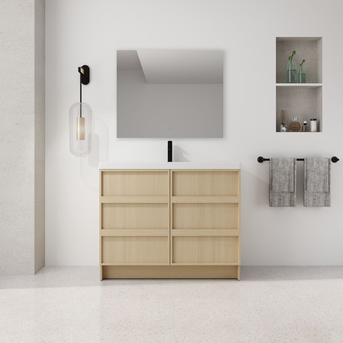 Freestanding bathroom vanity with white sink top and two-door cabinet with soft-close hinges