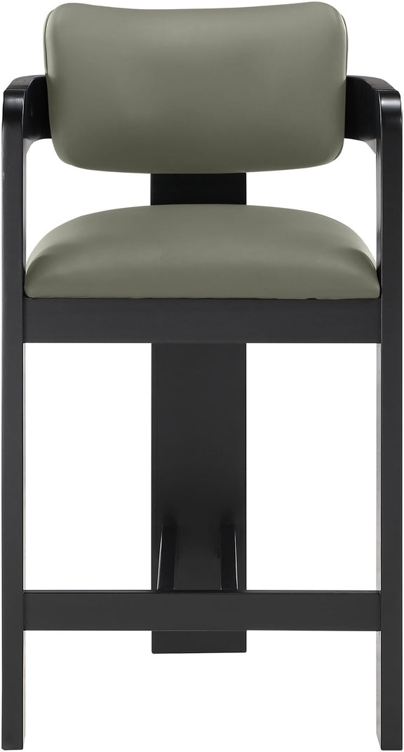 Vegan leather counter stool with sage green upholstered back and black ribbed frame