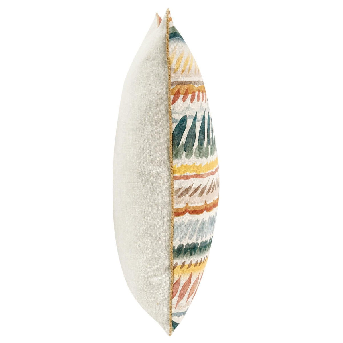 Side view of cream throw pillow with multicolor patterned insert and piped seam